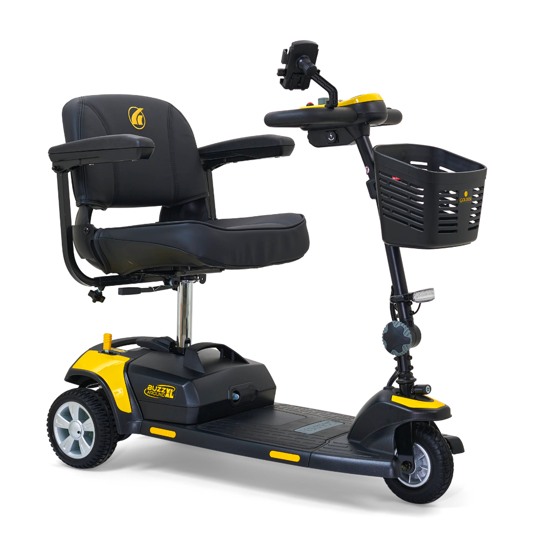 The Golden Tech GB121 Buzzaround XL 3-Wheel Portable Mobility Scooter has a black seat, armrests, yellow accents, three wheels, and a front basket. It offers an extended range battery and enhanced maneuverability for easy transportation and reliable performance.